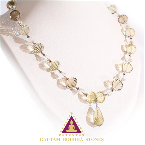 Collier en argent 925. Cristal de roche et quartz jaune. Tour de cou 50cm Collier en argent 925. Cristal de roche et quartz jaune. Tour de cou 50cm