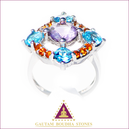 Bague en argent 925, améthyste, topazes bleues et hessonites Bague en argent 925, améthyste, topazes bleues et hessonites