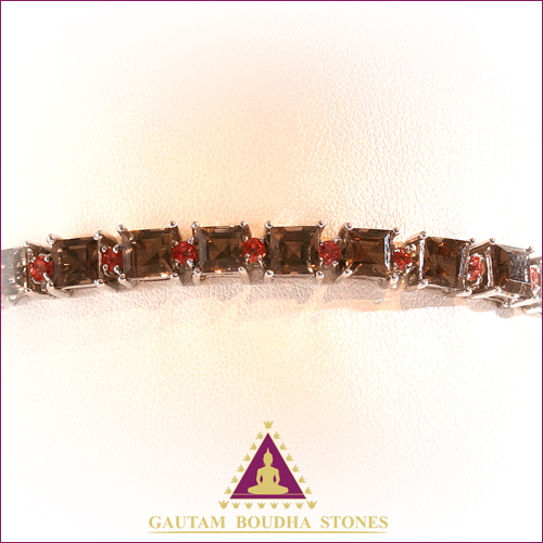Bracelet en argent 925. Rivière de quartz fumé et de saphir rose. Longueur 18cm Bracelet en argent 925. Rivière de quartz fumé et de saphir rose. Longueur 18cm
