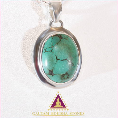 Pendentif en argent 925. Turquoise. Hauteur 2cm Pendentif en argent 925. Turquoise. Hauteur 2cm